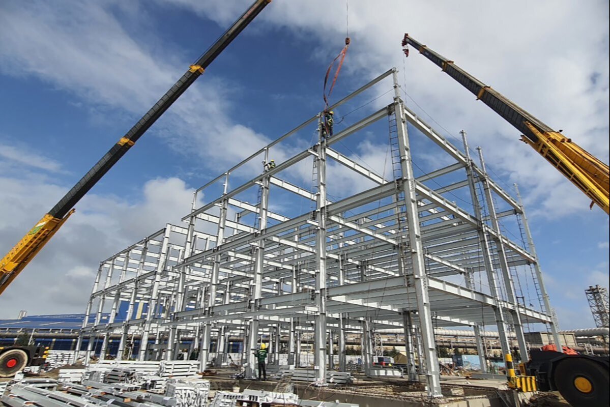 Structural steel erection at an industrial construction site